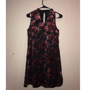 Black dress with velvet floral accents